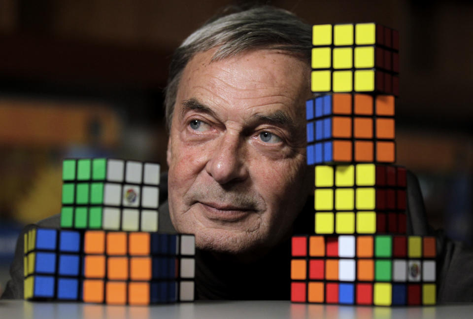 Erno Rubik, the inventor of the Rubik's Cube, poses for The Associated Press at Liberty Science Center, Wednesday, April 25, 2012, in Jersey City, N.J. The center is hosting an exhibit on Rubik's Cubes which will include a cube made with diamonds that is worth 2.5 million dollars. (AP Photo/Julio Cortez)