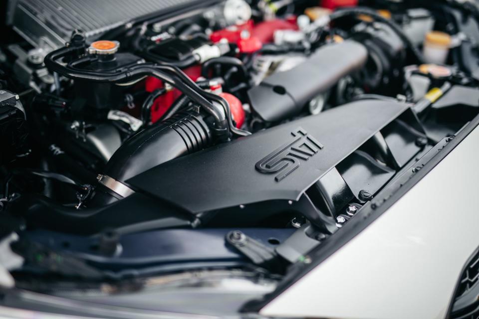 <p>The intake is redesigned to accommodate an easier-breathing conical air filter, and the intercooler gets a water sprayer to help cool the charged intake.</p>