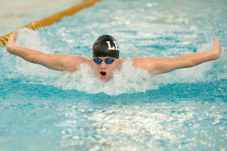 Lakeview swimmer Evan Yarger competes in the 100 yard butterfly race during the All-City swim meet at Lakeview High School on Saturday, Jan. 14, 2023.