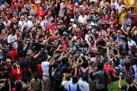 Protesters gather in front of a department store to mark the anniversary of a deadly army crackdown on an anti-government protest in 2010, in central Bangkok, Thailand May 19, 2018. REUTERS/Panu Wongcha-um