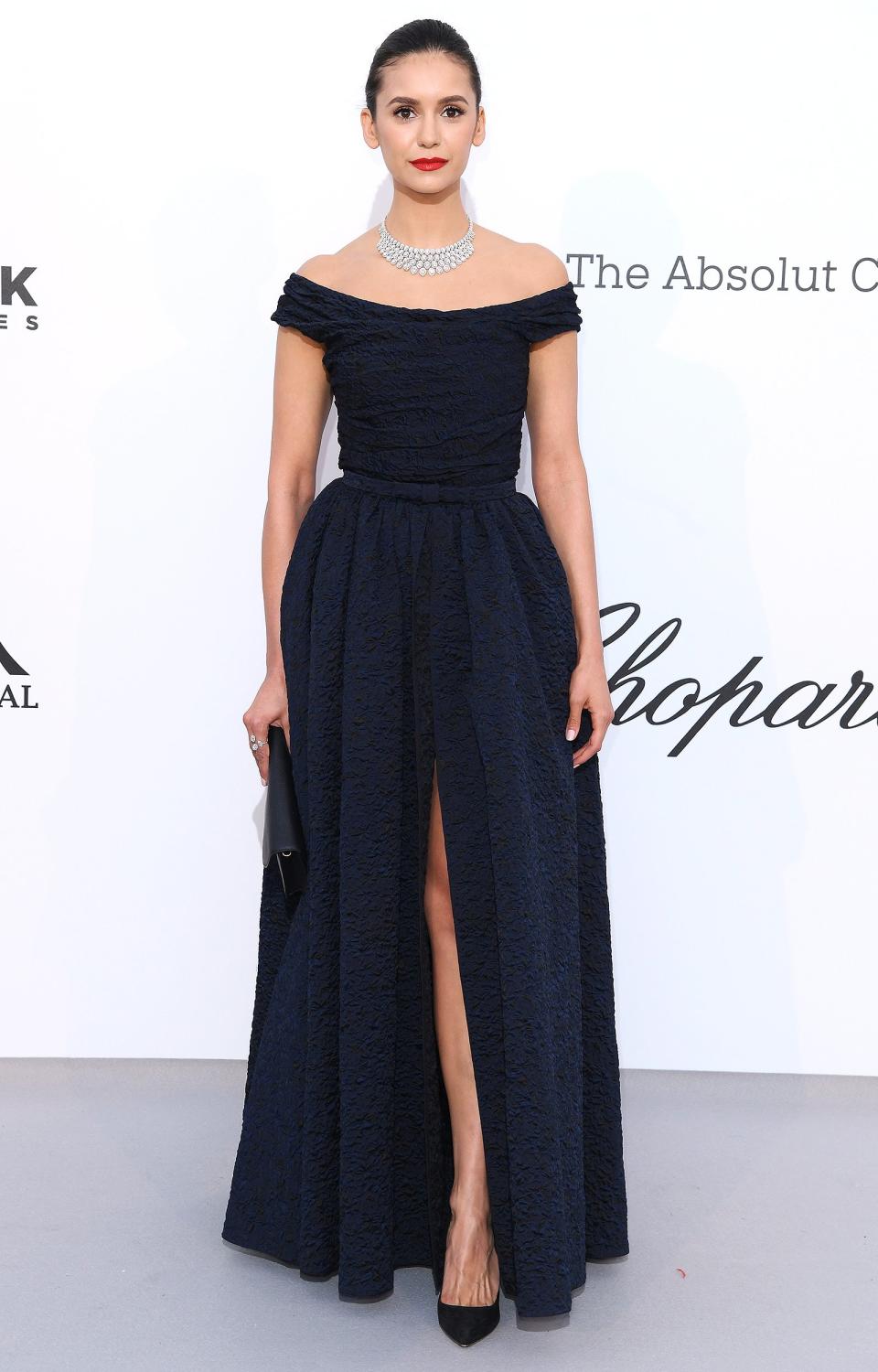 Nina goes old Hollywood in her Dior off-the-shoulder jacquard jumpsuit and skirt, with Dior shoes and clutch at the amfAR Gala.