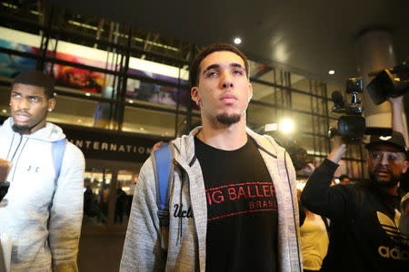 UCLA basketball player LiAngelo Ball arrives at LAX after flying back from China where he was detained on suspicion of shoplifting, in Los Angeles, California U.S. November 14, 2017. REUTERS/Lucy Nicholson