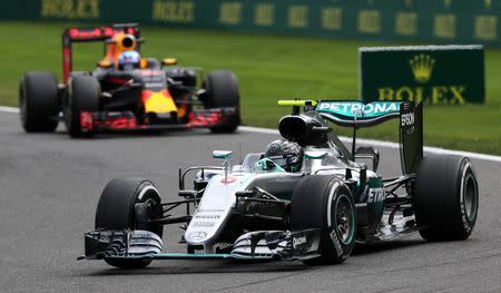 Belgium Formula One - F1 - Belgian Grand Prix 2016 - Francorchamps, Belgium - 28/7/16 - Mercedes' Nico Rosberg of Germany leads the race ahead of Red Bull's Daniel Ricciardo of Australia during the Belgian F1 Grand Prix. REUTERS/Yves Herman