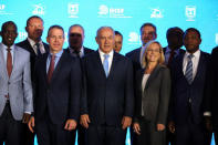 Israeli Prime Minister Benjamin Netanyahu stands next to U.S. Secretary of Homeland Security Kirstjen Nielsen and Israeli Public Security Minister Gilad Erdan during the International Homeland Security Forum conference in Jerusalem, June 14, 2018. REUTERS/Ammar Awad