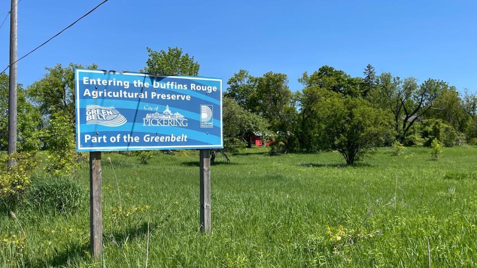 A sign welcomes drivers to the Duffins Rouge Agricultural Preserve, the largest parcel of land the Ford government removed from the Greenbelt last December.