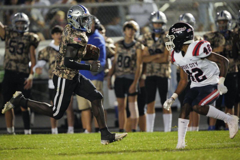 Central Crossing’s Malik Kamara, left, was first-team all-district and third-team all-state in Division I last year.