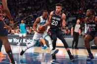 Dec 9, 2018; New York, NY, USA; Charlotte Hornets guard Kemba Walker (15) drives the ball past New York Knicks forward Kevin Knox (20) in the second quarter at Madison Square Garden. Catalina Fragoso-USA TODAY Sports