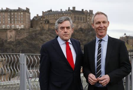 Former British Prime Minister Gordon Brown (L) poses with Scottish Labour Party leader Jim Murphy before delivering his speech on powers for the Scottish Parliament, in Edinburgh, Scotland February 2, 2015. REUTERS/Russell Cheyne