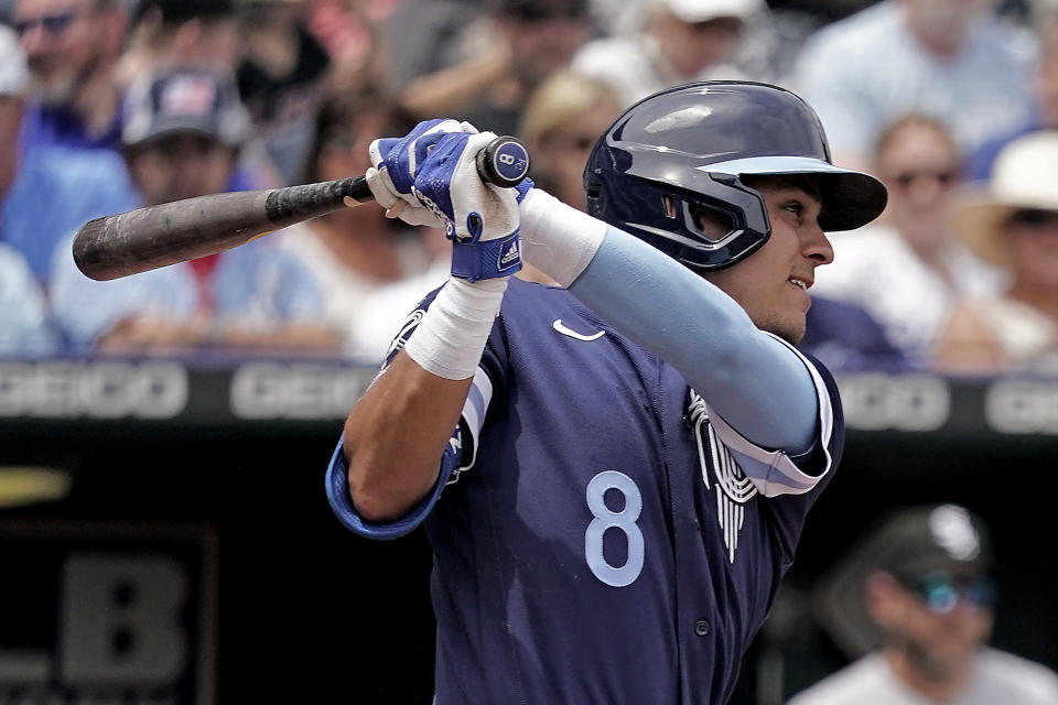 Kansas City Royals' Nicky Lopez hits an RBI double during the second inning of a baseball game against the Chicago White Sox Thursday, May 19, 2022, in Kansas City, Mo. (AP Photo/Charlie Riedel)