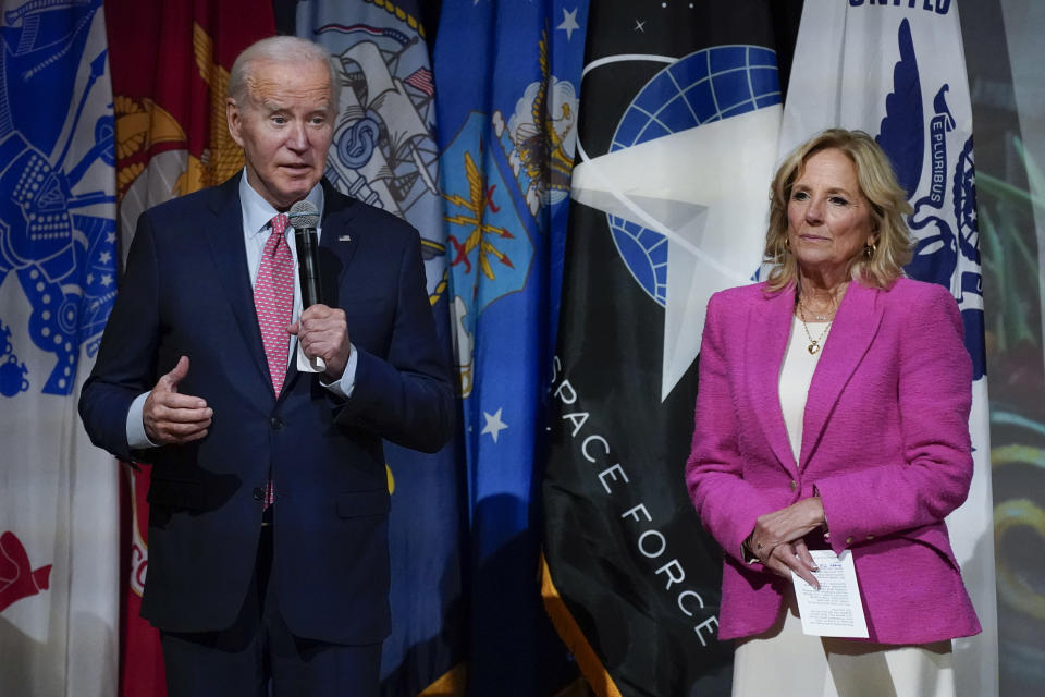 President Joe Biden speaks before a screening of the movie "Wonka" as first lady Jill Biden looks on in Norfolk, Va., Sunday, Nov. 19, 2023. The film is about the early life of Roald Dahl's eccentric chocolatier, Willy Wonka. (AP Photo/Manuel Balce Ceneta)