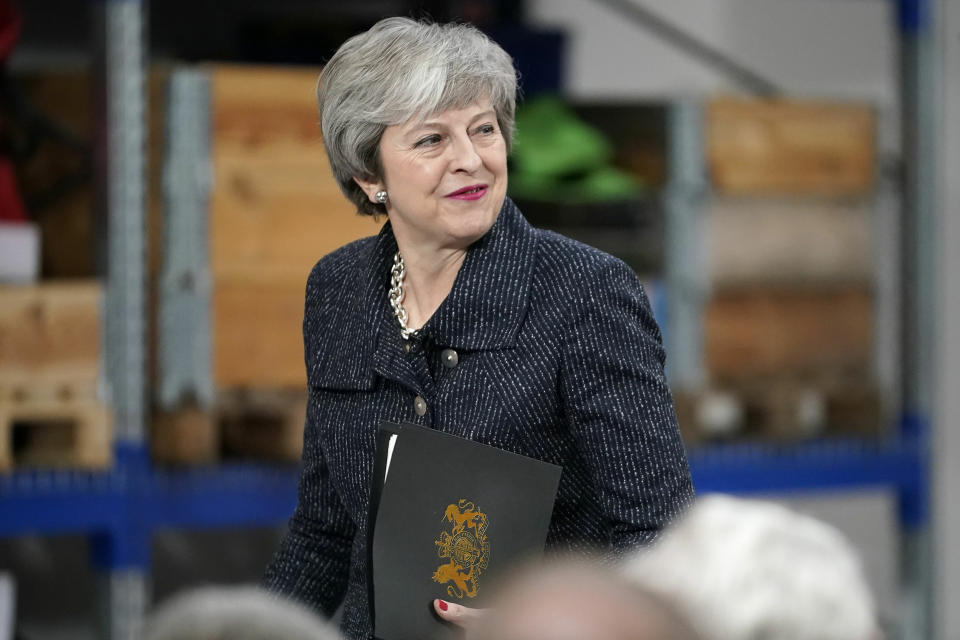 Britain's Prime Minister Theresa May gives a speech in Grimsby, Britain, Friday March 8, 2019. Battling to stave off a second defeat for the unpopular deal, May also implored the EU to help her make "one more push" to get her Brexit agreement through a skeptical British Parliament.(Christopher Furlong/PA via AP)