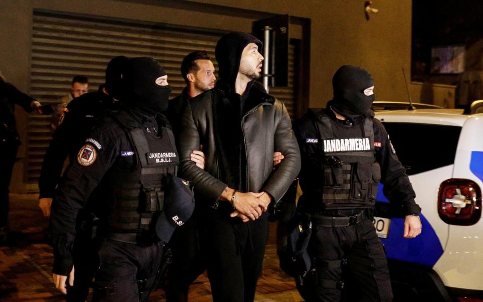 Andrew Tate and his brother Tristan Tate, escorted by police officers in Bucharest - INQUAM PHOTOS/Octav Ganea