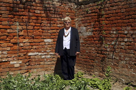 Ruzica Barbaric, 63, who said she was raped during the 1991-95 war of independence from Yugoslavia, poses for a picture in Vukovar, east Croatia, April 19, 2015. REUTERS/Antonio Bronic