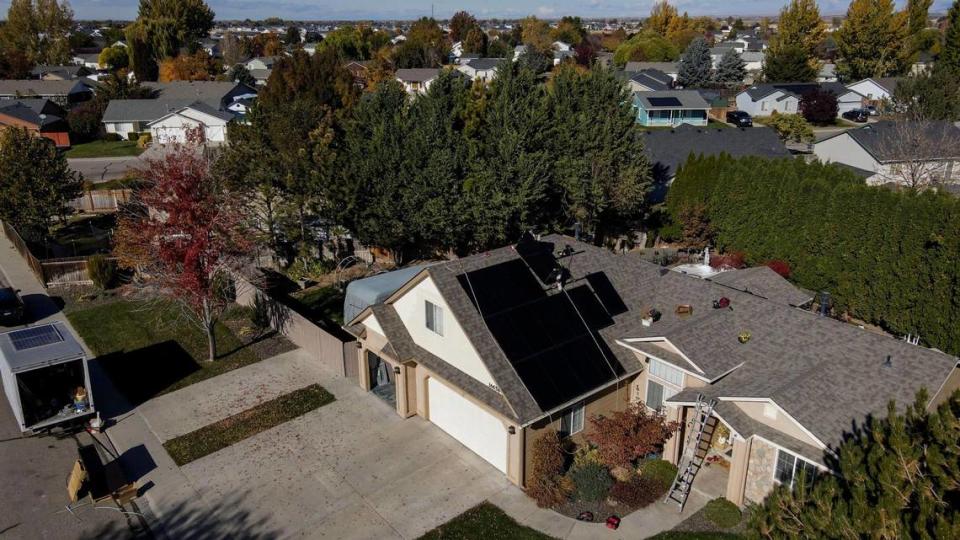 Sun Driven Solar installs solar panels on the roof of a Nampa home in November 2022.