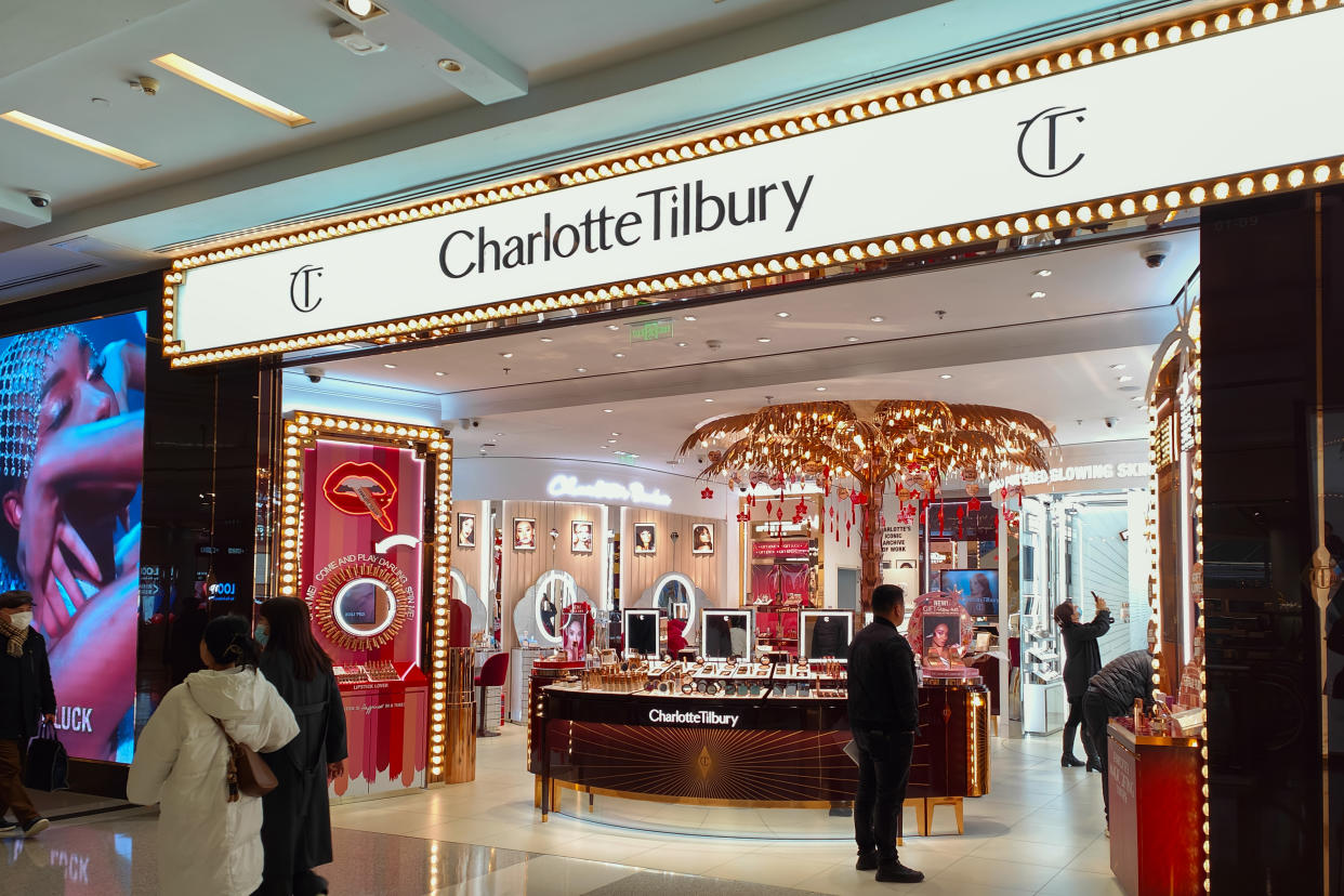 SHANGHAI, CHINA - FEBRUARY 10, 2023 - People walk past a CharlotteTilbury store in Shanghai, China, February 10, 2023. CharlotteTilbury is a makeup brand from the United Kingdom. The brand name comes from the founder's name. (Photo credit should read CFOTO/Future Publishing via Getty Images)