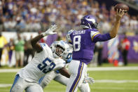 Detroit Lions outside linebacker Charles Harris (53) pressures Minnesota Vikings quarterback Kirk Cousins (8) during the second half of an NFL football game, Sunday, Oct. 10, 2021, in Minneapolis. (AP Photo/Bruce Kluckhohn)