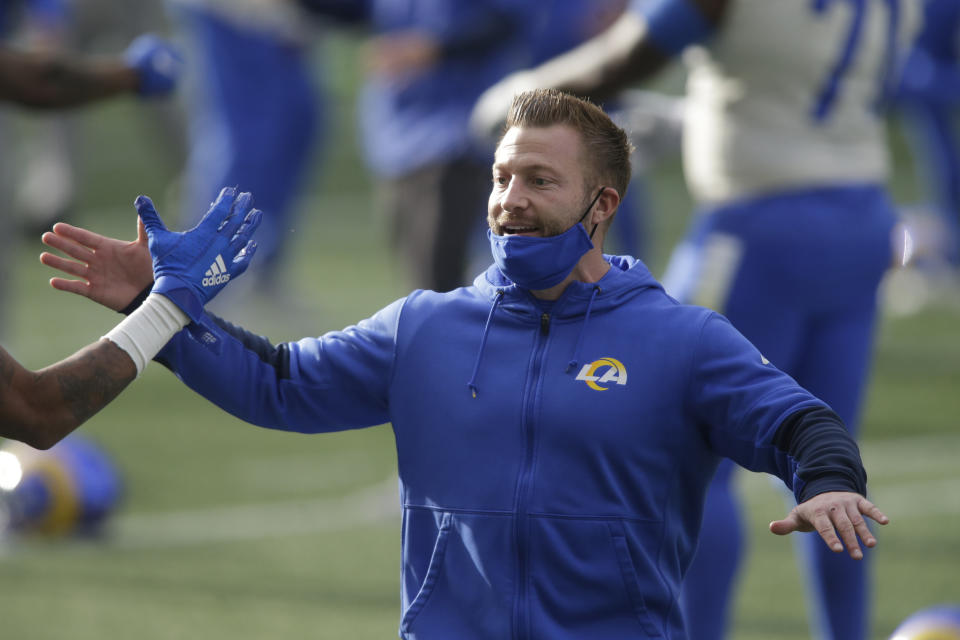 Los Angeles Rams head coach Sean McVay greets players before an NFL wild-card playoff football game against the Seattle Seahawks, Saturday, Jan. 9, 2021, in Seattle. (AP Photo/Scott Eklund)