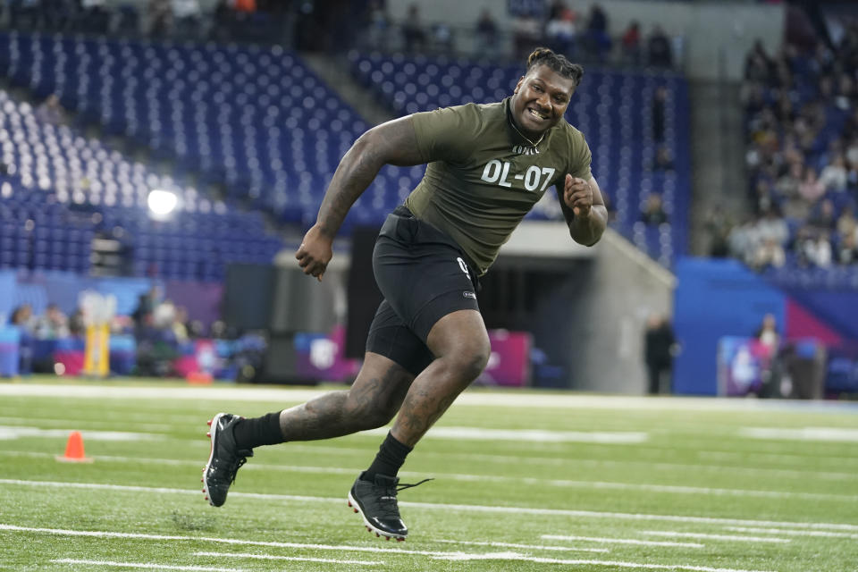 FILE - Florida defensive lineman Gervon Dexter runs a drill at the NFL football scouting combine in Indianapolis, March 2, 2023. The Chicago Bears addressed their shaky defense in the second round of the NFL draft, taking Dexter with the No. 53 pick and Miami cornerback Tyrique Stevenson three spots later after trading up with the Jacksonville Jaguars. (AP Photo/Darron Cummings, File)