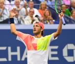 Sept 4, 2016; New York, NY, USA; Lucas Pouille of France winning a game late in the fifth set against Rafael Nadal of Spain (not pictured) on day seven of the 2016 U.S. Open tennis tournament at USTA Billie Jean King National Tennis Center. Mandatory Credit: Robert Deutsch-USA TODAY Sports