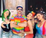 The stars of <em>Vanderpump Rules</em> went all out with their L.A. Pride looks this year. Kent traded in her blonde locks for a bright green wig, Clark went for a classic rainbow-colored button-up tee, Schroeder wore a rainbow-colored feather crown and Cartwright opted for a multi-colored bodysuit.