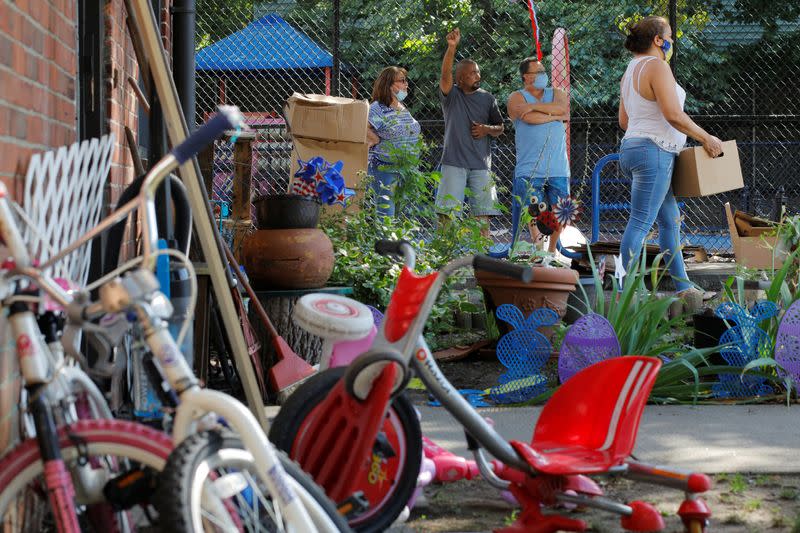 Volunteers from the Chelsea Collaborative distribute free groceries in Chelsea