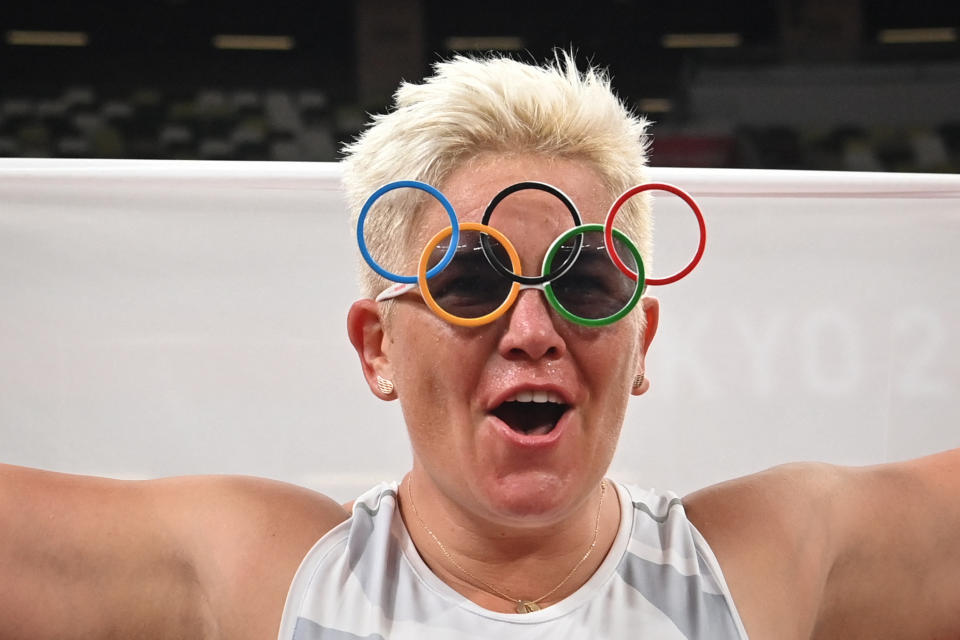 <p>Gold medallist Poland's Anita Wlodarczyk celebrates after the women's hammer throw final during the Tokyo 2020 Olympic Games at the Olympic Stadium in Tokyo on August 3, 2021. (Photo by Andrej ISAKOVIC / AFP) (Photo by ANDREJ ISAKOVIC/AFP via Getty Images)</p> 