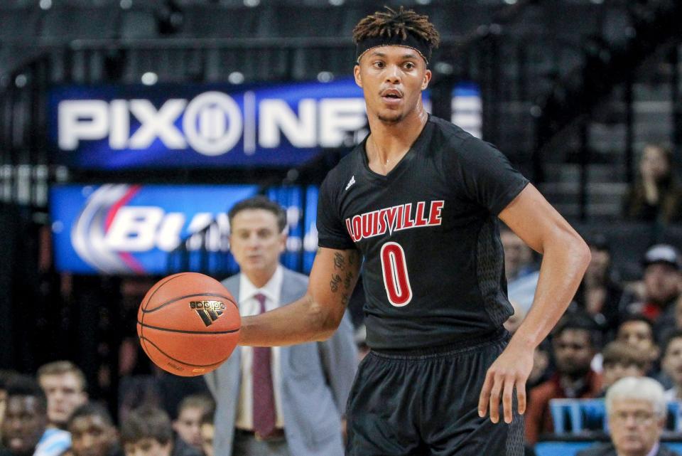 Louisville Cardinals guard Damion Lee (0) looks to pass in his game against the Saint Louis Billikens at Barclays Center on Nov. 28, 2015.