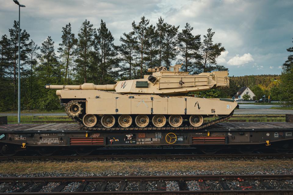 M1A1 Abrams tanks needed for training Ukrainian soldiers await offloading in Grafenwoehr, Germany.