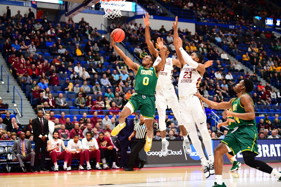 <p>Stef Smith #0 of the Vermont Catamounts drives to the rim against the Florida State Seminoles in the first round of the 2019 NCAA Men’s Basketball Tournament held at XL Center on March 21, 2019 in Hartford, Connecticut. (Photo by Ben Solomon/NCAA Photos via Getty Images) </p>