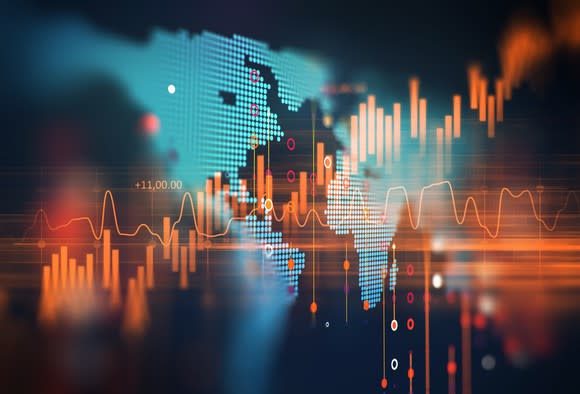 Lines on a stock chart on top of a map of the world.