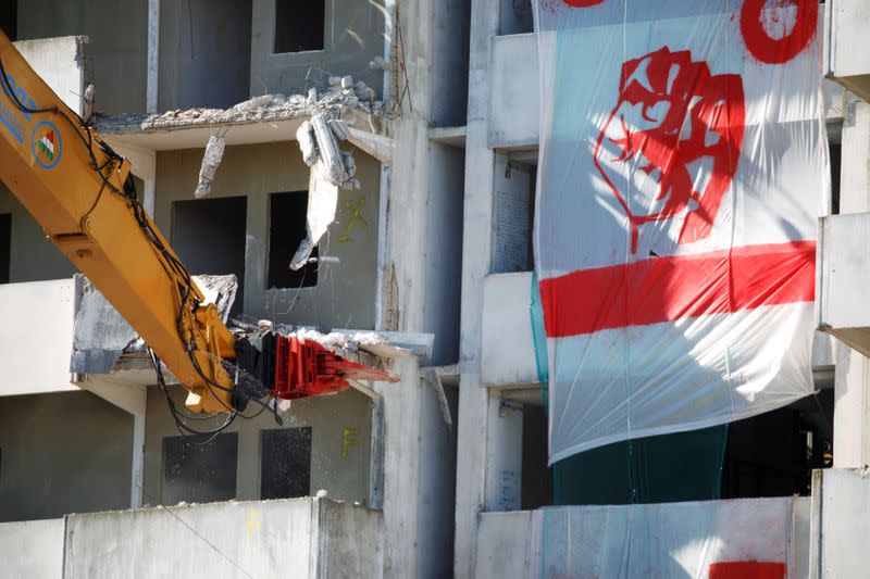 One of the so-called "Sails of Scampia", a tower block known as a stronghold of Naples mafia, is demolished