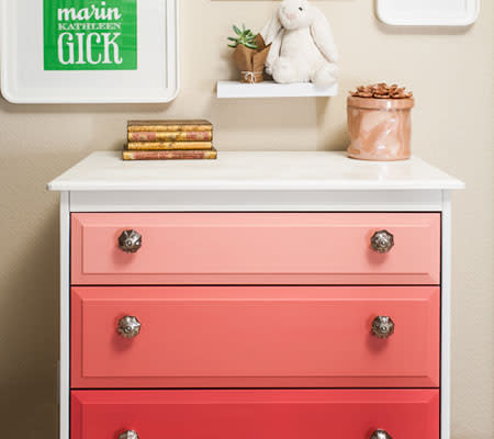 <div class="caption-credit"> Photo by: Project Nursery</div><b>Jazz Up the Changer</b> <br> Whether it's a simple coat of paint or a trendsetting Ombre pattern, upcycling what you already own is a great way to make something old, new again.