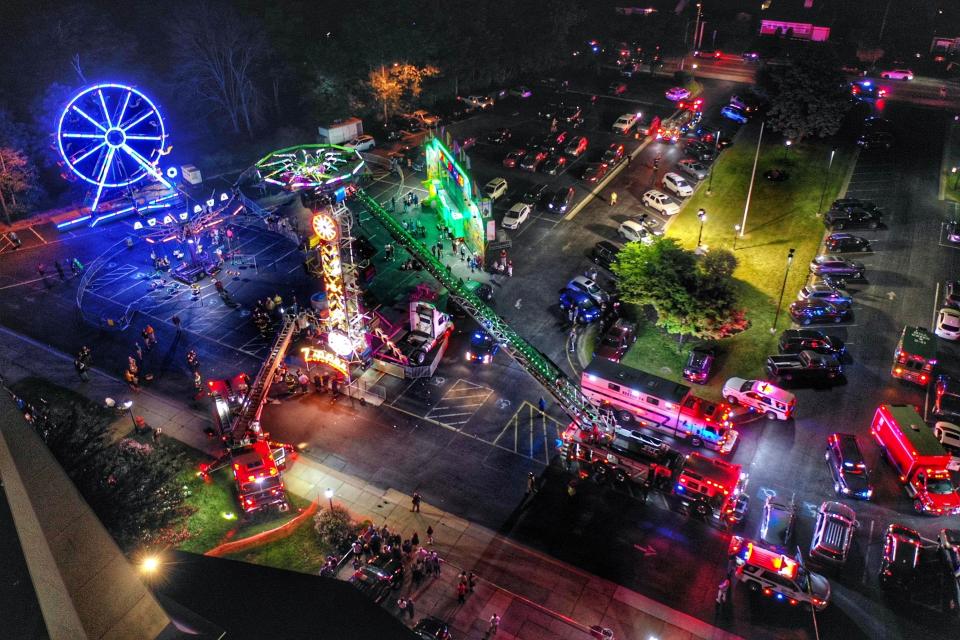 An amusement ride malfunctioned at St. John the Beloved Church's annual carnival, leaving 20 people trapped on the Zipper ride for hours on June 6, 2023.