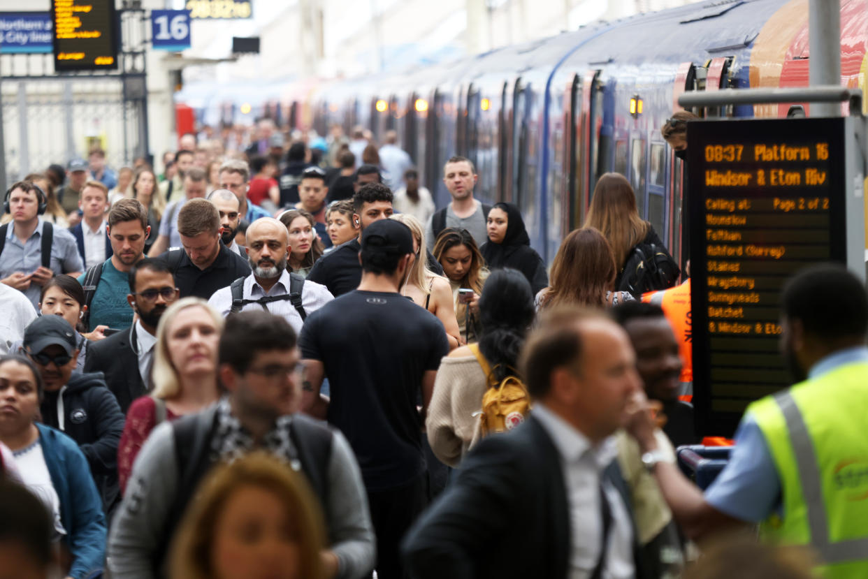 Passengers at Waterloo station, as train services continue to be disrupted following the nationwide strike by members of the union in a bitter dispute over pay, jobs and conditions. Picture date: Thursday June 23, 2022.