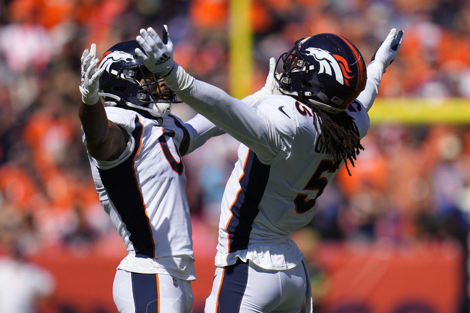 Denver Broncos linebacker Randy Gregory (5) celebrates a sack against Washington Commanders quarterback Sam Howell, not pictured, in the first half of an NFL football game, Sunday, Sept. 17, 2023, in Denver. (AP Photo/Jack Dempsey)