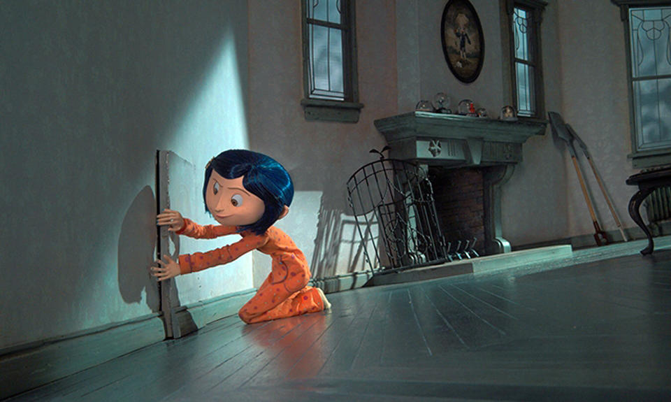 Coraline opening the door to the other world