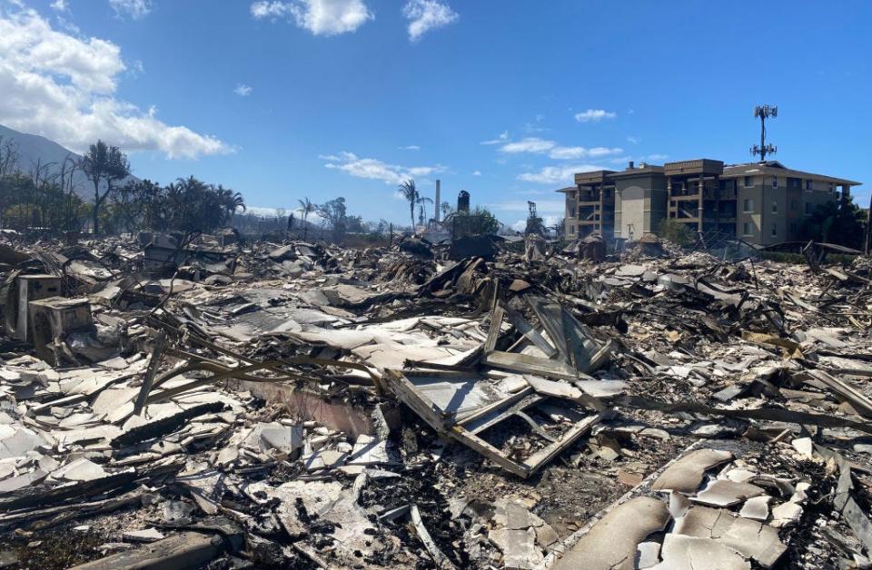 Destroyed buildings and homes are pictured in the aftermath of a wildfire in Lahaina, western Maui, Hawaii on August 11, 2023. A wildfire that left Lahaina in charred ruins has killed at least 55 people, authorities said on August 10, making it one of the deadliest disasters in the US state's history. Brushfires on Maui, fueled by high winds from Hurricane Dora passing to the south of Hawaii, broke out on August 8 and rapidly engulfed Lahaina.