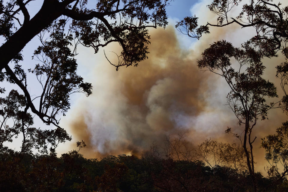 Smoke approaches a property on Putty Road on November 15, 2019 in Colo Heights, Australia. The warning has been issued for a 80,000-hectare blaze at Gospers Mountain, which is burning in the direction of Colo Heights. An estimated million hectares of land has been burned by bushfire across Australia following catastrophic fire conditions - the highest possible level of bushfire danger - in the past week. A state of emergency was declared by NSW Premier Gladys Berejiklian on Monday 11 November and is still in effect, giving emergency powers to Rural Fire Service Commissioner Shane Fitzsimmons and prohibiting fires across the state. Four people have died following the bushfires in NSW this week. (Photo by Brett Hemmings/Getty Images)