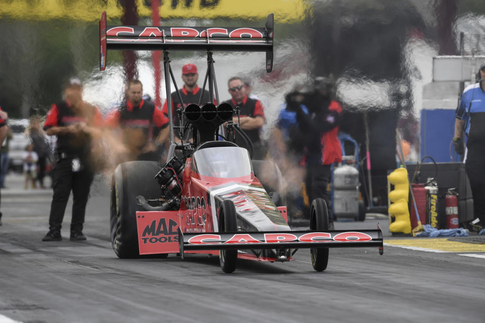 In this photo provided by the NHRA, Steve Torrence takes part in Top Fuel qualifying Saturday, May 22, 2021, for the Mopar Express Lane NHRA SpringNationals drag races at Houston Raceway Park in Baytown, Texas. (Jerry Foss/NHRA via AP)