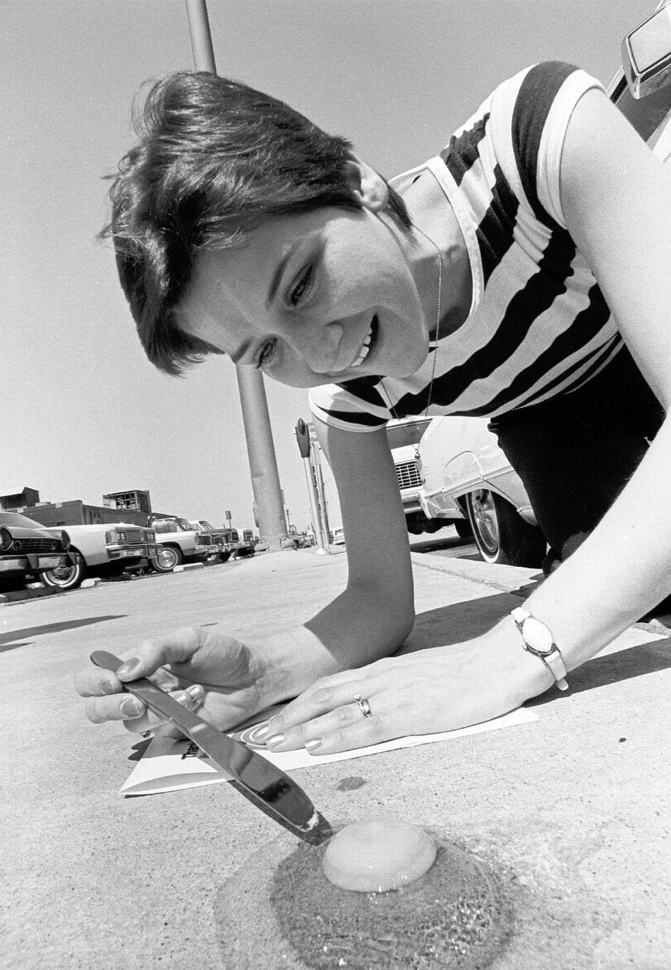 June 26, 1980: A woman fries an egg on a concrete sidewalk in Fort Worth as temperatures 110 degrees during a heat wave. Vince Heptig/Fort Worth Star-Telegram archive/UT Arlington Special Collections