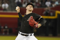 Arizona Diamondbacks staring pitcher Ryne Nelson throws to an Atlanta Braves batter during the first inning of a baseball game Saturday, June 3, 2023, in Phoenix. (AP Photo/Darryl Webb)