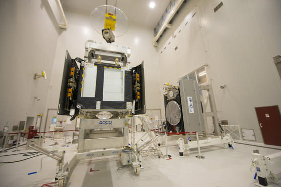 The first two Galileo Full Operational Capability satellites (SAT 5-6) during preparations inside the S5A building, before fuelling operations, on July 30, 2014. The satellites were launched into the wrong orbit by their Soyuz rocket on Aug. 22