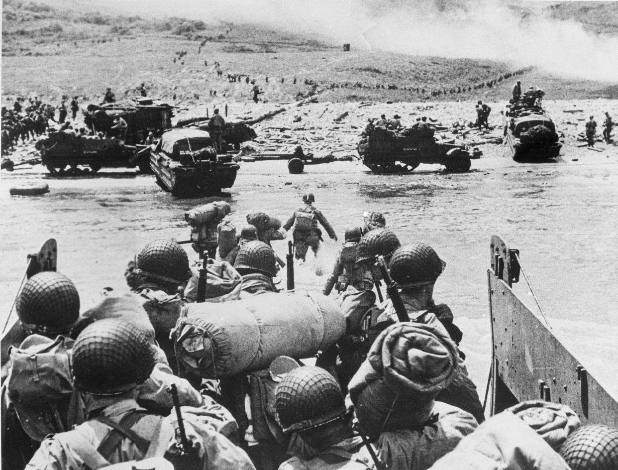 American soldiers and supplies arrive on the shore of the French coast of German-occupied Normandy during the Allied D-Day invasion on June 6, 1944 in World War II.