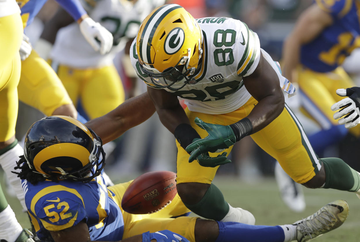 Green Bay Packers running back Ty Montgomery (88) fumbles late in the fourth quarter against the Rams, a play that led to controversy. (AP)