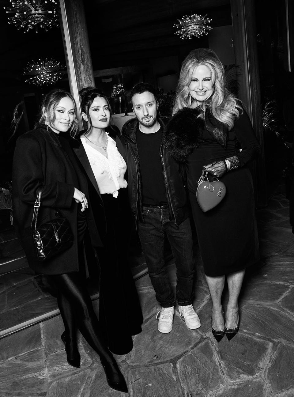 Olivia Wilde, Salma Hayek, Anthony Vaccarello and Jennifer Coolidge attend an intimate dinner hosted by W editor-in-chief Sara Moonves and Saint Lauren creative director Anthony Vaccarello at a private residence in Los Angeles on March 9, 2023.