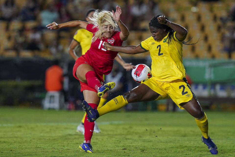 Jamaica's Satara Murray (2) blocks a shot by Canada's Nichelle Prince during a CONCACAF Women's Championship soccer semifinal match in Monterrey, Mexico, Thursday, July 14, 2022. (AP Photo/Fernando Llano)