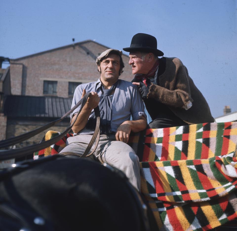 Stage and screen actors Harry H Corbett (1925 - 1982) and Wilfrid Brambell (1912 - 1985), stars of the British television comedy series 'Steptoe and Son'.   (Photo by Mike Lawn/Getty Images)