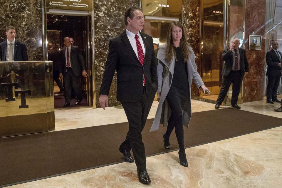 FILE - New York Gov. Andrew Cuomo, left, accompanied by his top aide, Melissa DeRosa, walks to talk with members of the media after meeting with President-elect Donald Trump at Trump Tower in New York, Jan. 18, 2017. In a phone interview, Monday, April 17, 2023, DeRosa described her upcoming memoir, "What's Left Unsaid: My Life at the Center of Power, Politics, and Crisis," as a chance for her to reflect, set the record straight and give an insider's account of tumultuous events. (AP Photo/Andrew Harnik, File)
