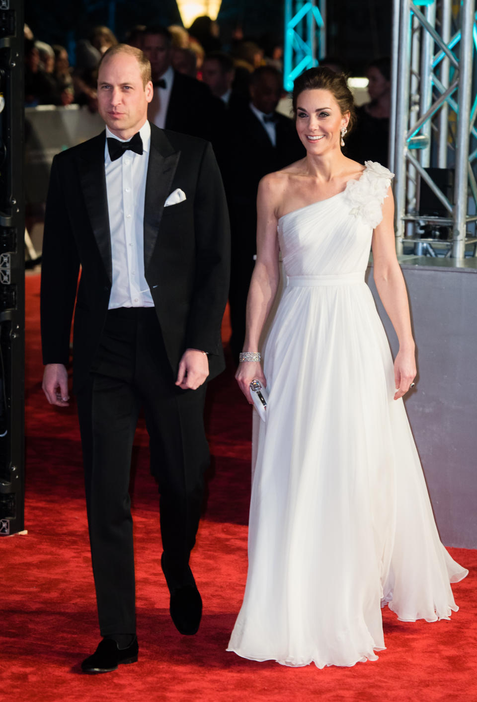 The Duchess of Cambridge wore a beautiful, bespoke, one-shoulder gown by Alexander McQueen for the annual red carpet event, while the Duke looked dapper in a traditional tux. <em>[Photo: Getty]</em>