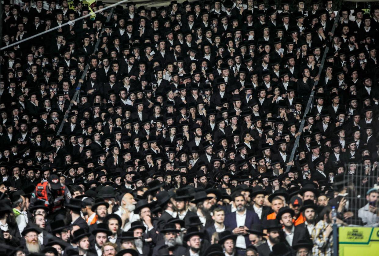 <span class="caption">Ultra-Orthodox Jews gather at the gravesite of Rabbi Shimon Bar Yochai at Mount Meron in northern Israel on April 29, 2021, as they celebrate the Jewish holiday of Lag BaOmer.</span> <span class="attribution"><a class="link " href="https://www.gettyimages.com/detail/news-photo/ultra-orthodox-jews-gather-at-the-grave-site-of-rabbi-news-photo/1232595538?adppopup=true" rel="nofollow noopener" target="_blank" data-ylk="slk:Jalaa Marey/AFP via Getty Images;elm:context_link;itc:0;sec:content-canvas"> Jalaa Marey/AFP via Getty Images</a></span>